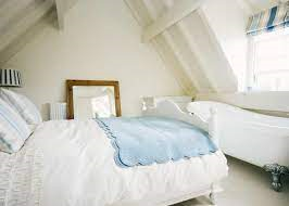 Double bedroom beneath the cottage eaves