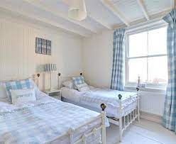 Light twin bedroom with traditional beds